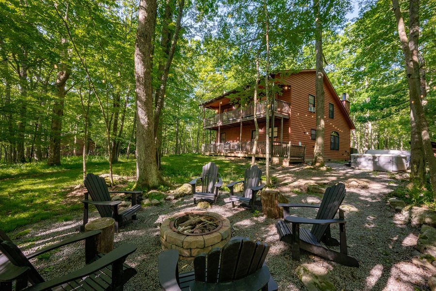 Cabin with fire pit in the woods